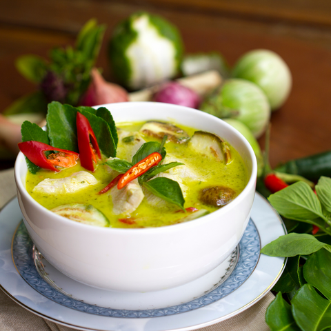 A bowl of warm Thai green curry great with fragrant jasmine rice