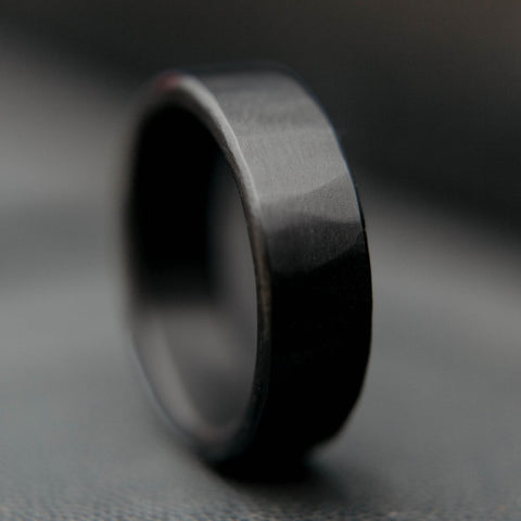 Hammered Black Zirconium Wedding Band (vertical with black backdrop)