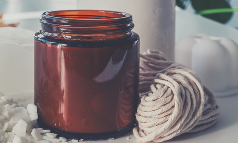 Brown tinted glass candle jar