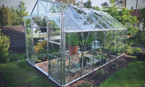 backyard greenhouse with accessories