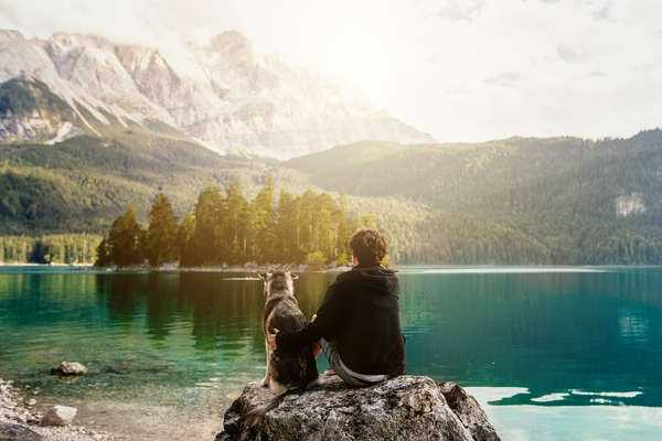 Man with dog in nature