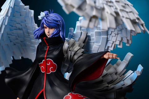 Konan's demeanor resembles the tranquil surface of a serene lake, concealing torrents of heartbreak, intelligence, and resilience beneath her seemingly impassive, almost bitter countenance.