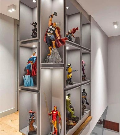 If you have a sizable collection, it's worth considering the utilization of bookshelves to showcase your items.