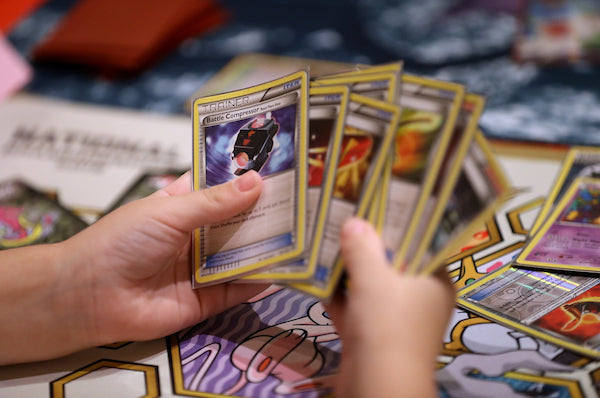 How to play pokemon card game in real life