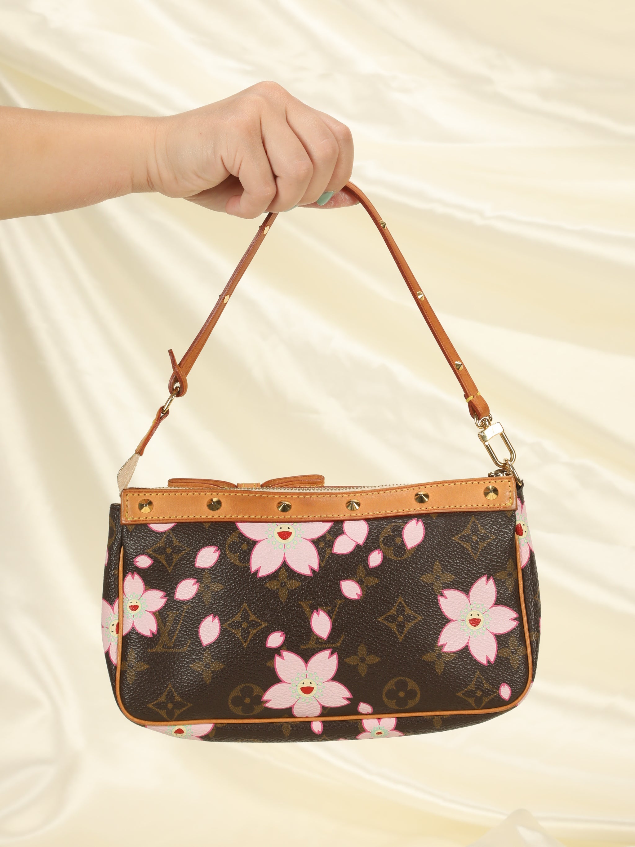 Authentic Louis Vuitton x Takashi Murakami Cherry Blossom Pochette, Luxury,  Bags & Wallets on Carousell