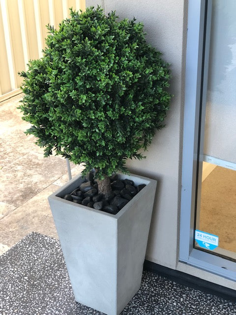 artificial topiary on front porch