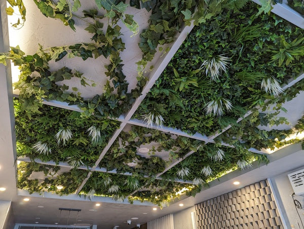 faux greenery for ceiling decor