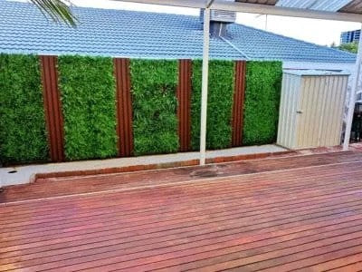 installation of lush fern vertical garden