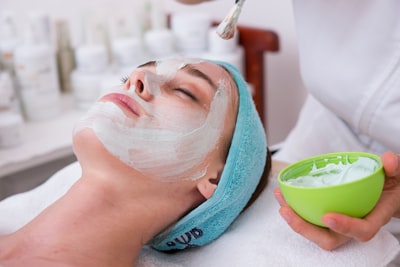 woman with spa treatment mask