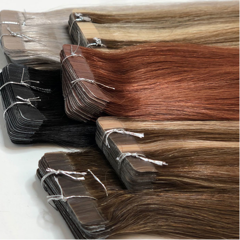Tape-in human hair extensions