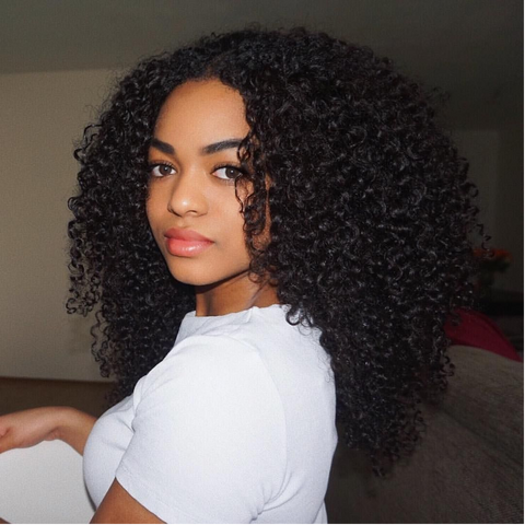 Model with brazilian curly hair extensions