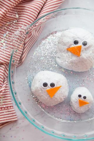 baking soda experiment making snowman melt in sensory bin play