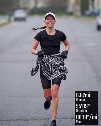 female marathon runner wearing stabilyx ventilator shorts in black
