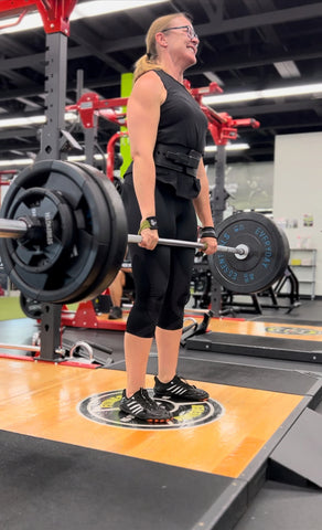 female athlete heavy lifting in endurance generator 3/4 tights