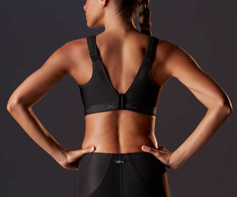 female athlete wearing stabilyx high impact sports bra in black