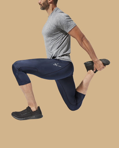 man stretching after workout wearing CW-X compression pant