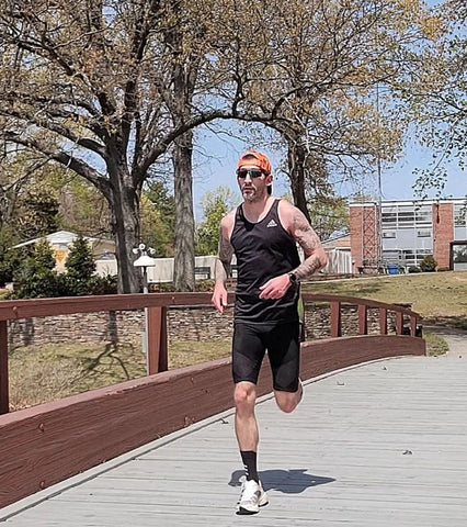 male athlete running wearing stabilyx ventilator shorts