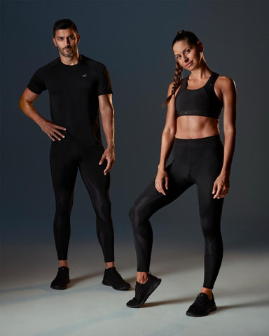 male and female athlete posing in endurance generator tights in black