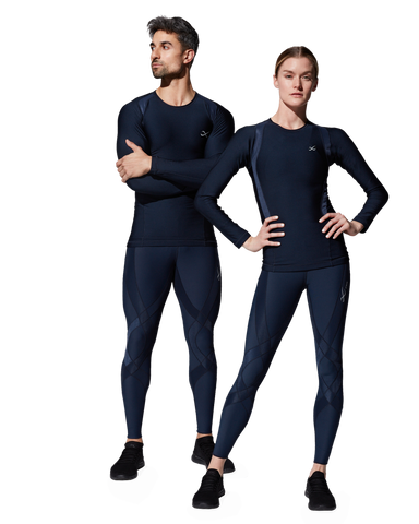 man and woman wearing CW-X Compression Clothing