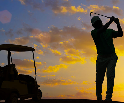 golfer with golf cart