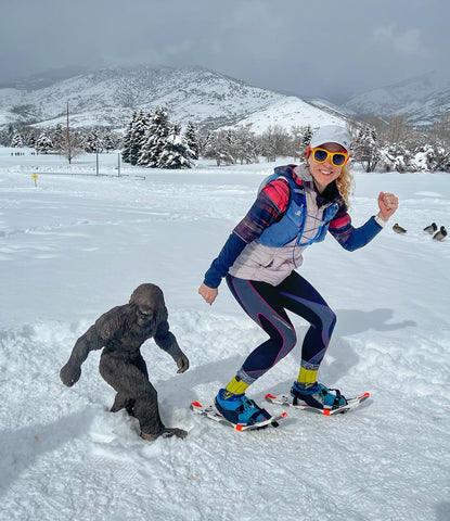 female athlete wearing cw-x tights in the snow after a run