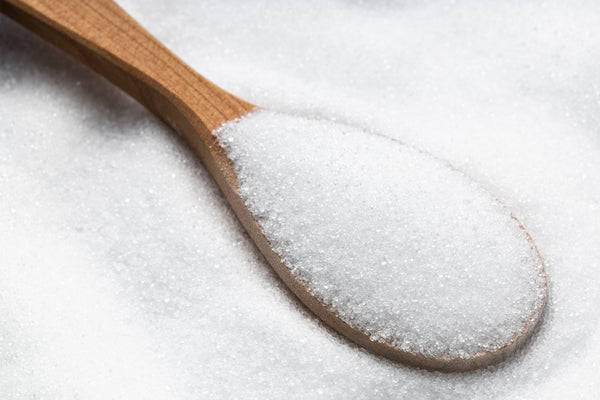 stevia on a wooden spoon