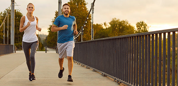 Two Friends Running Together