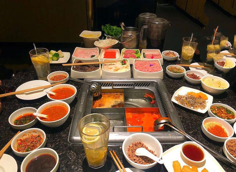 Indulge in a comforting hotpot feast in one of Singapore's popular hotpot restaurants such as Beauty in the Pot or Hai Di Lao!