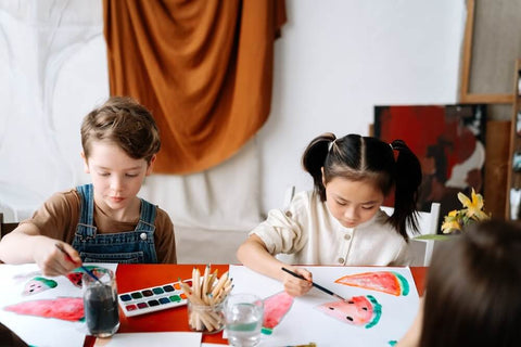 Kids painting their very own artwork. Photo by cottonbro studio.