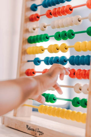 Montessori Abacus Toy. Photo by luis arias.