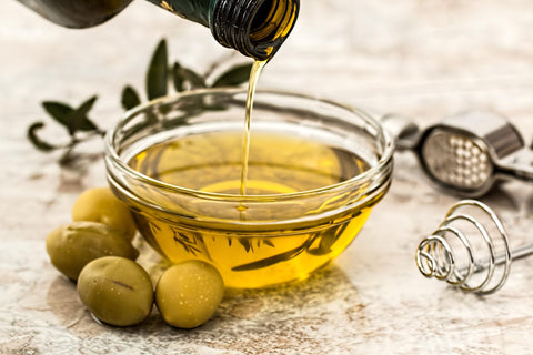 Olive oil in a glass bowl