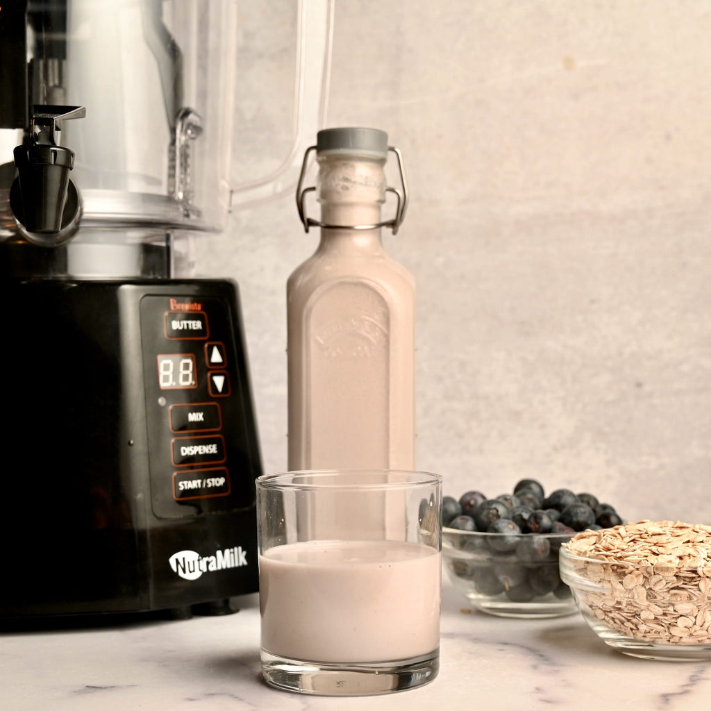 A glass bottle filled with a homemade plant-based milk