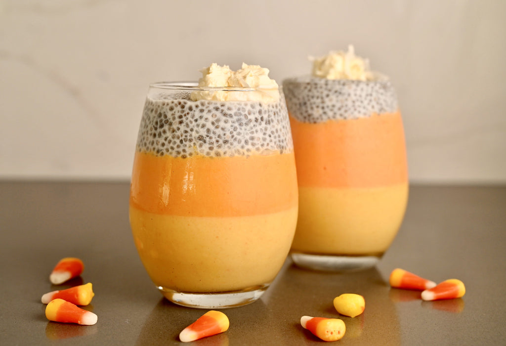 Candy corn chia seed parfait in a clear glass
