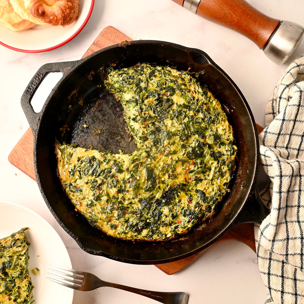 Spinach quiche in a cast iron skillet