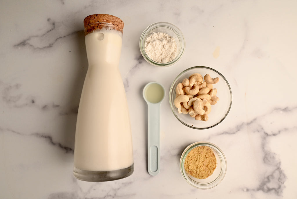 A glass container of plant-based milk