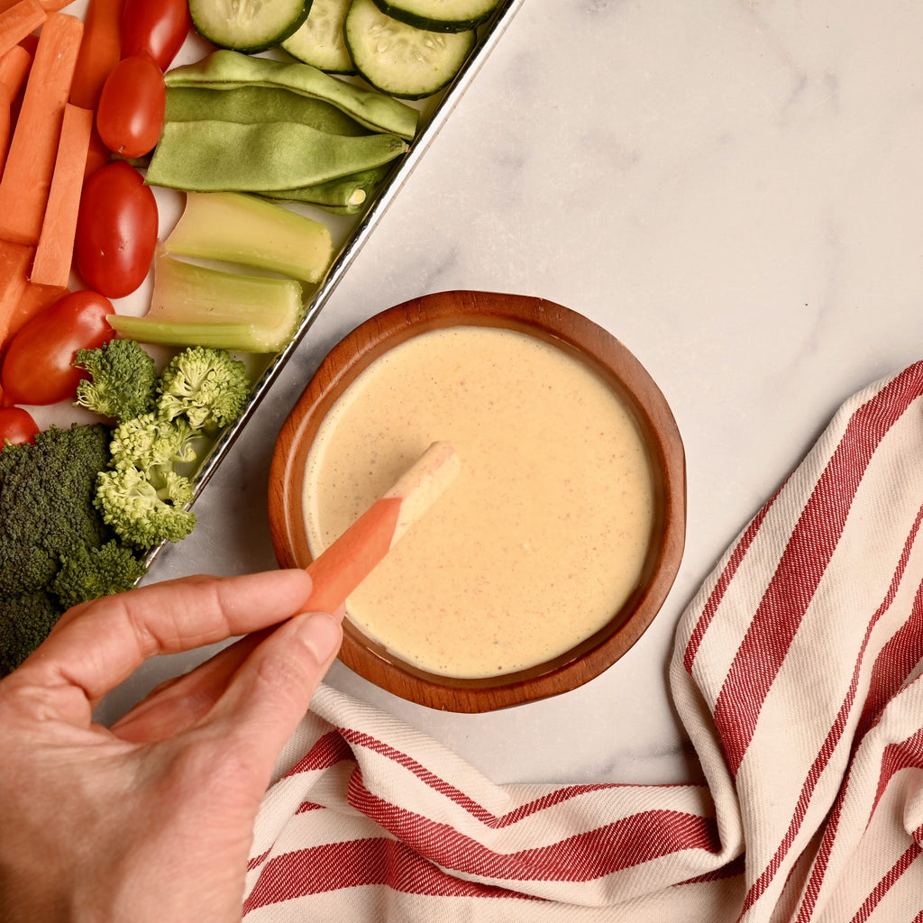 A close up of raw vegetables on a tray