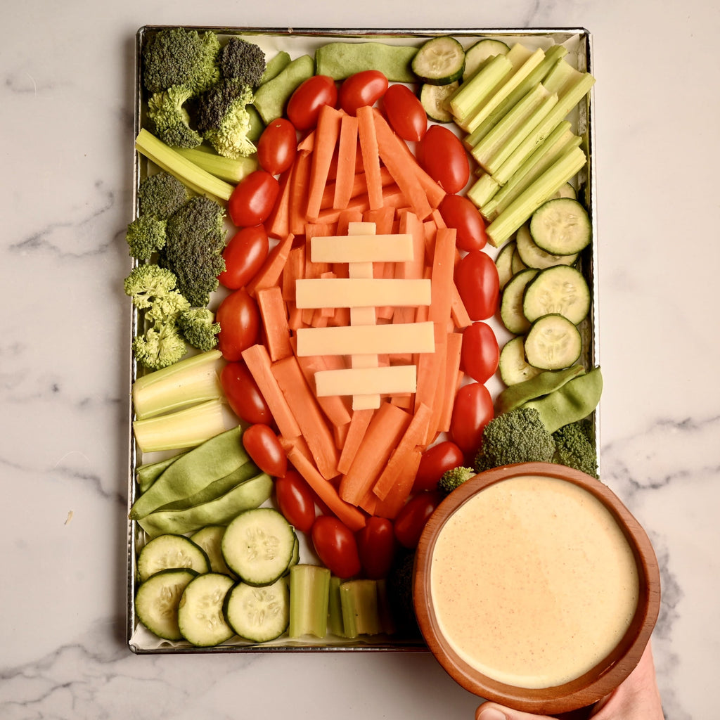 A close up of raw vegetables on a tray