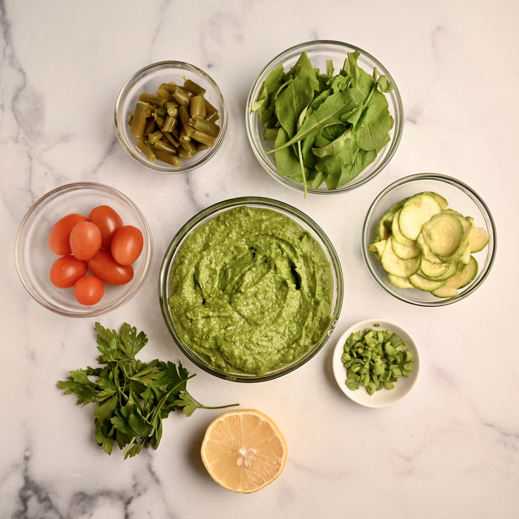 Clear glass bowls filled with raw ingredients