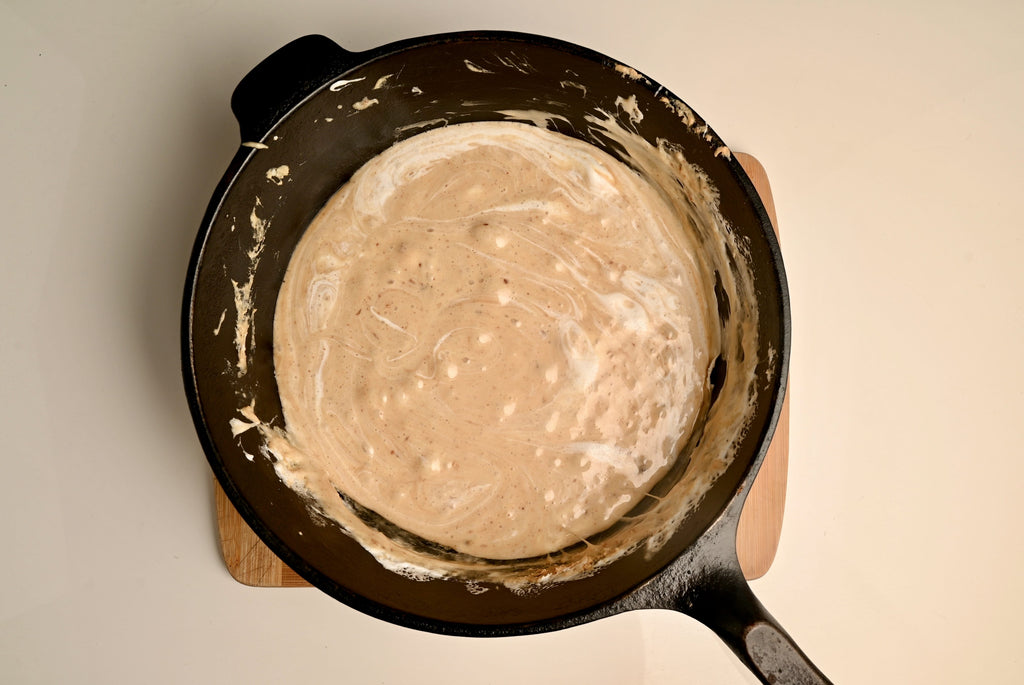 Melted ingredients in a black cast iron skillet