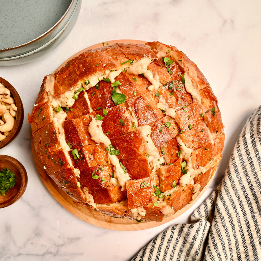 A loaf of cheesy pull apart bread