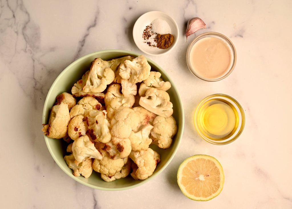 An above view of roasted cauliflower in a big bowl