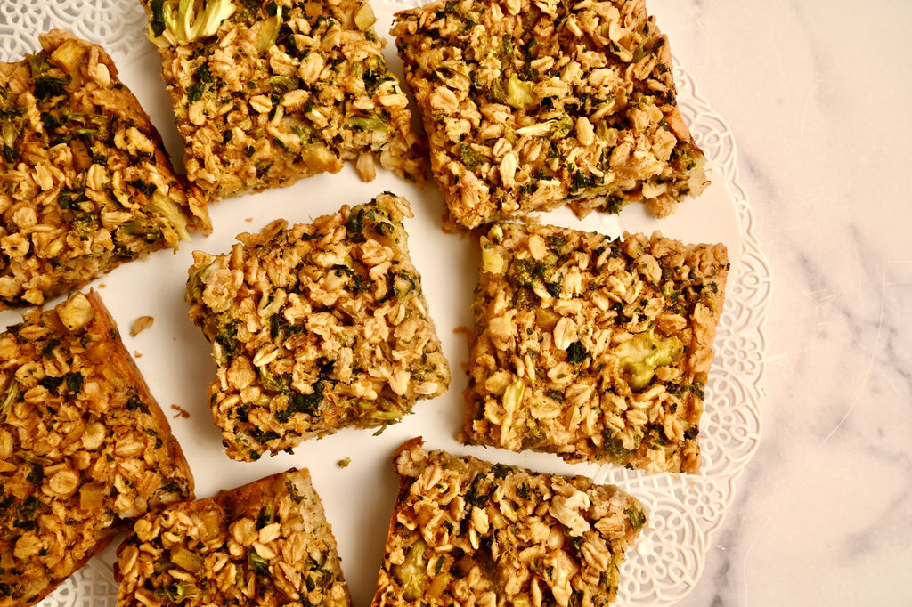 A close up of savory veggie oatmeal bars freshly baked and straight out of the oven