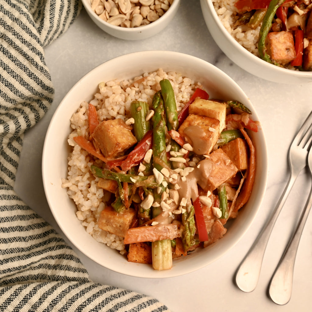 A close up of tofu and vegetable stir fry