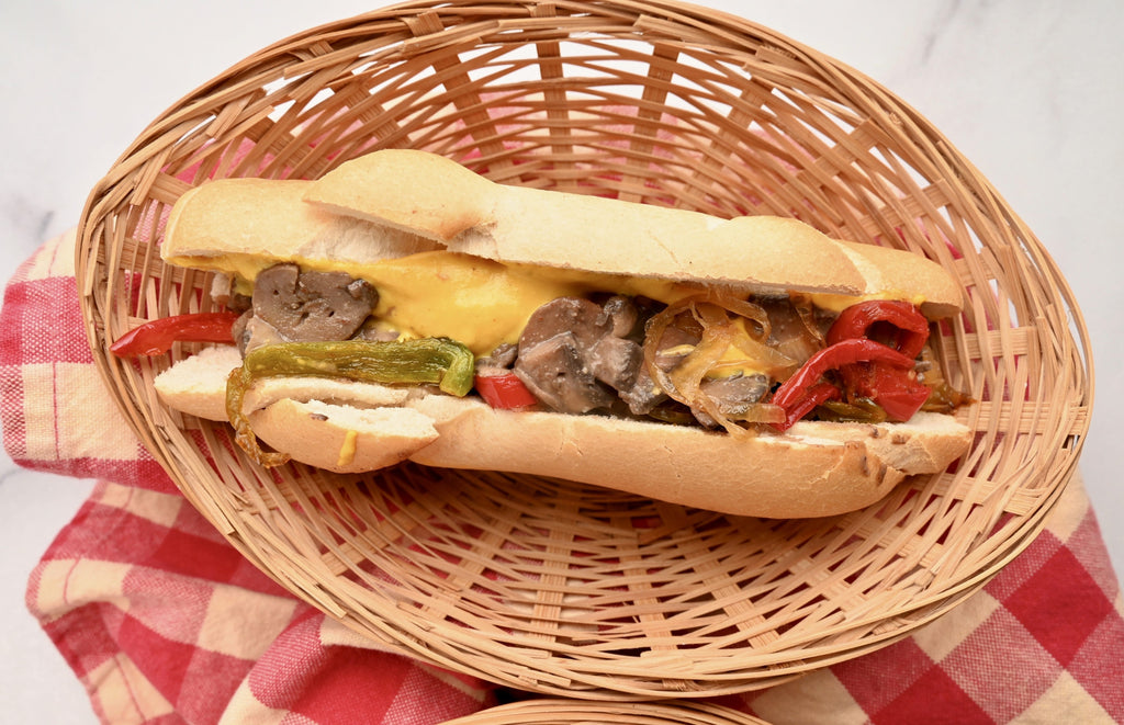 Philly cheesesteak sandwich in basket
