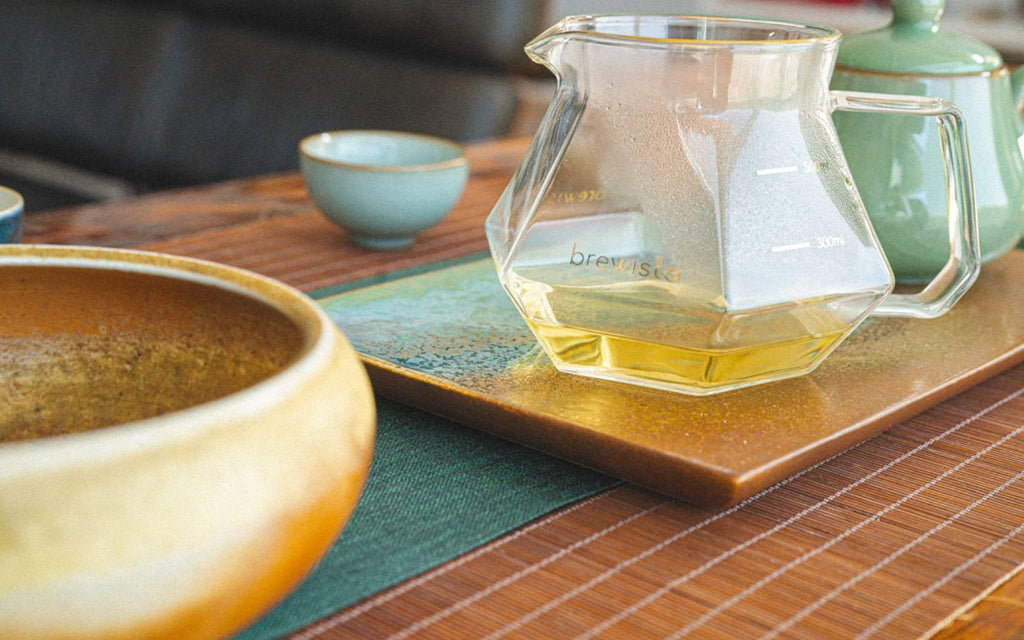 The Brewista X Series Glass Server sits along side GongFu tea ware.