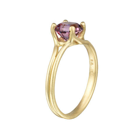 the wisteria ring with a rhodolite garnet