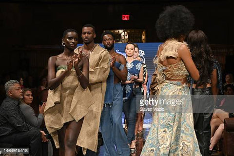 models clapping at the end of the show