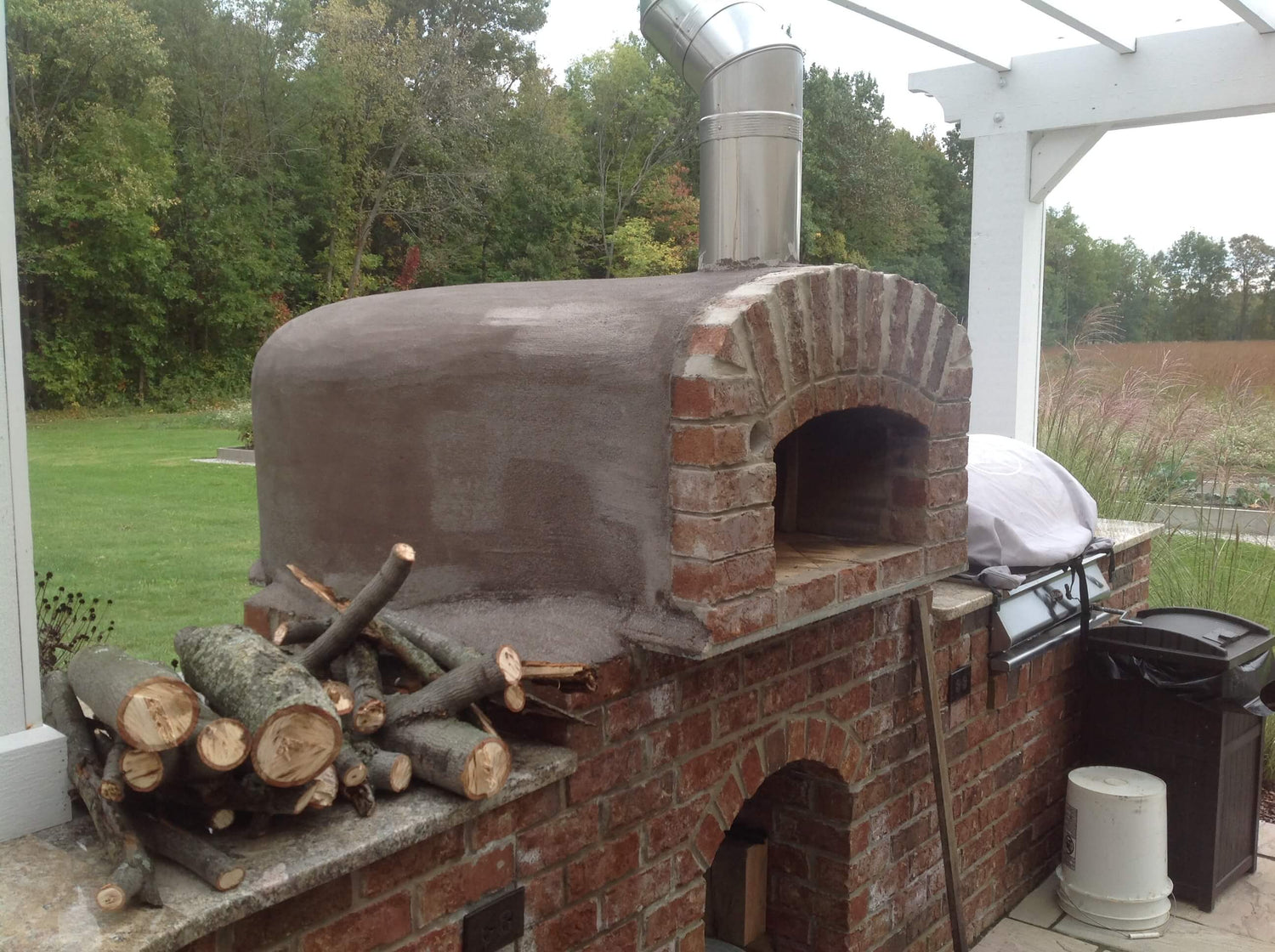 Castable Refractory Cement In a Pail - Construction Materials Needed to  Build a BrickWood - BrickWood Ovens