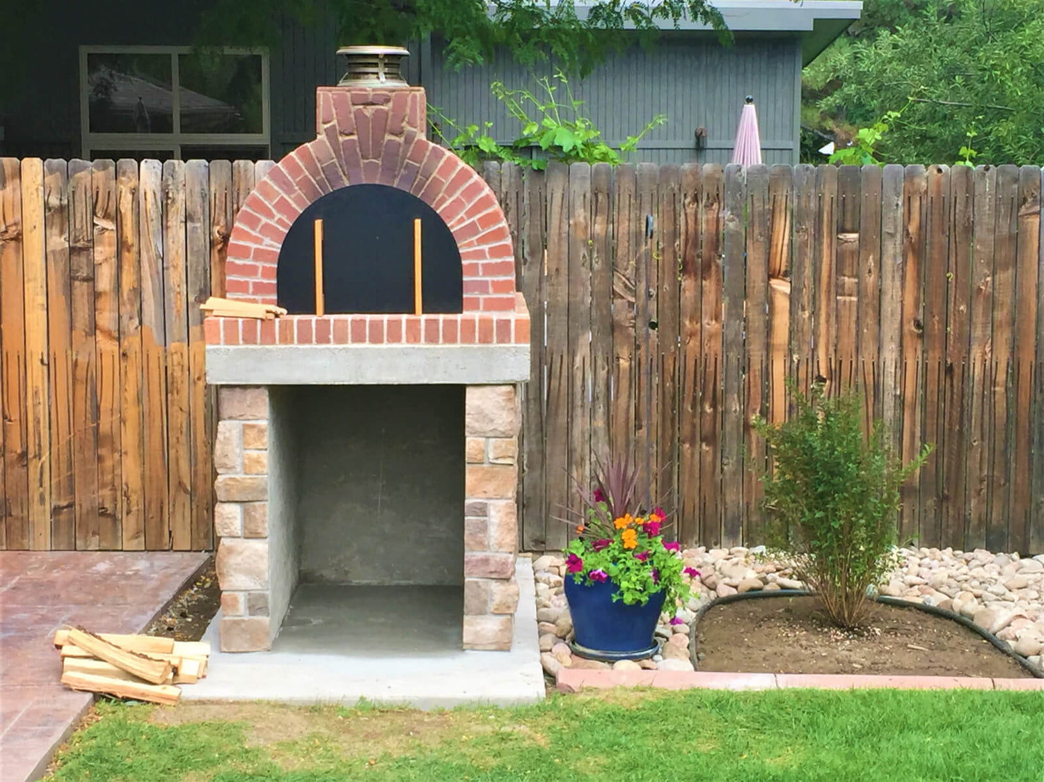 https://cdn.shopify.com/s/files/1/0568/6758/6256/t/9/assets/wood-fired-outdoor-pizza-ovens-16-YcW_1500x.JPG?v=1665293176