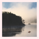 A canoeist and an Algonquin misty morning